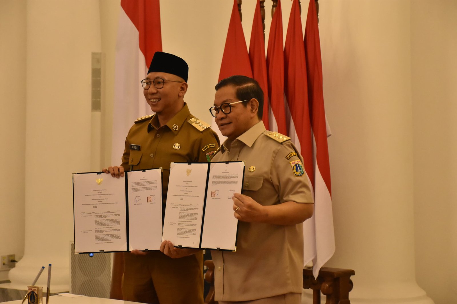 Pemerintah Provinsi Lampung Dan DKI Jakarta Menandatangani MoU Strategis Untuk Adopsi Aplikasi JAKI Dan Penguatan Distribusi Pangan Antar Provinsi