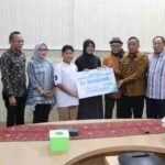 BPJS Serahkan Santunan JKM Rp194 Juta ke Keluarga PTHL Kominfotik