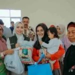 Ketua TP PKK Lampung Salurkan Bantuan Sosial di Kota Metro